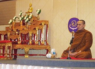 Abbot Phra Cholyamunee from Wat Uthukepsimaram urges evacuees and those concerned by the flooding to remain calm and not lament the losses of material possessions.